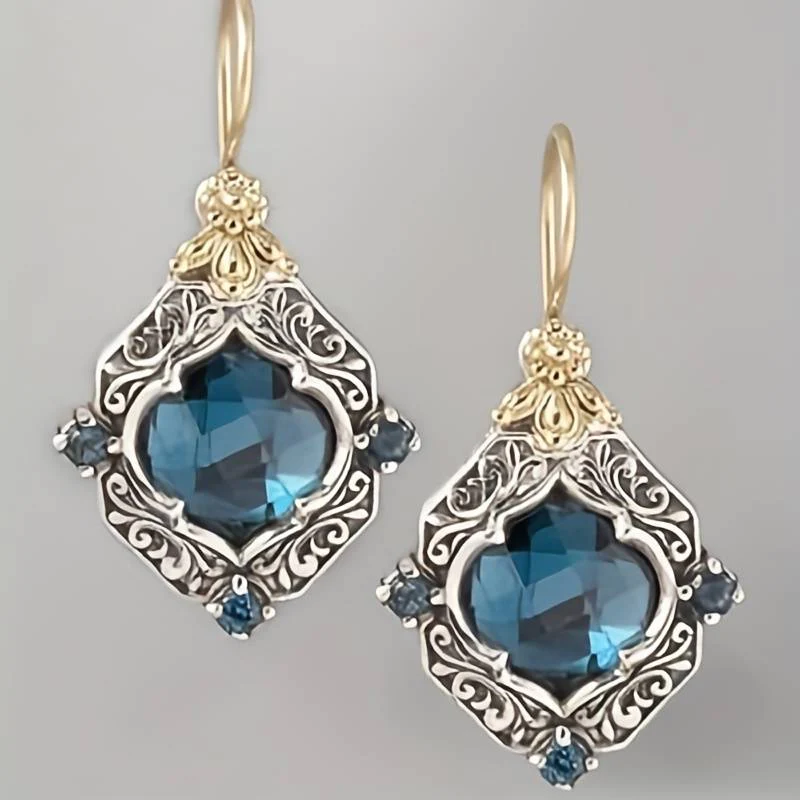Blaue Kristall-Ohrringe in Gold und Silber