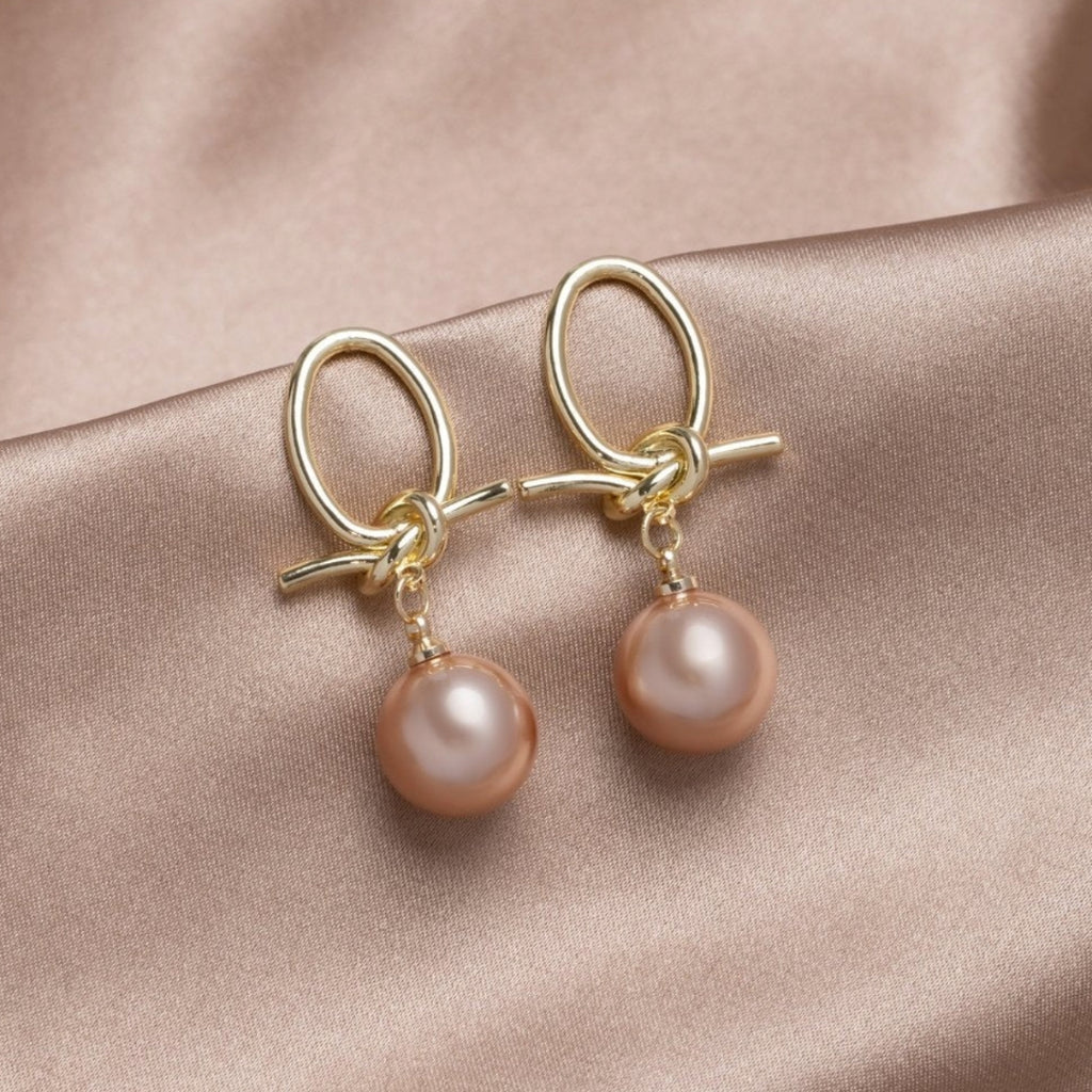 Perlenschleifen-Ohrringe in Gold